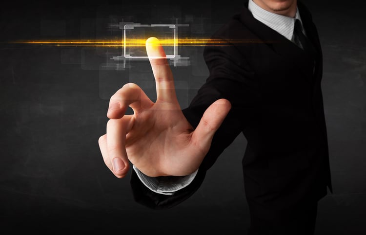 Tech person touching button with orange light beams concept